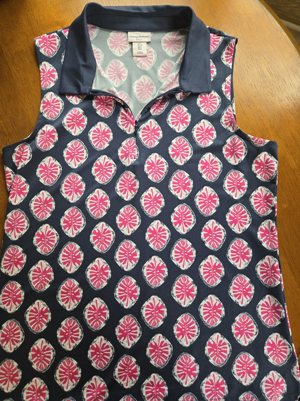 Tommy Bahama Navy Sleeveless Golf Polo with Pink Shell Print